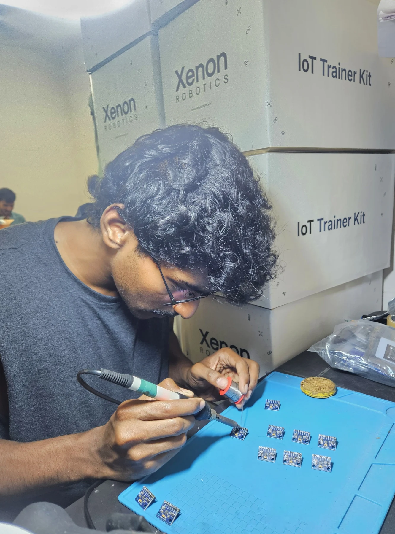 Hands-on electronics work at the Xenon Robotics workbench