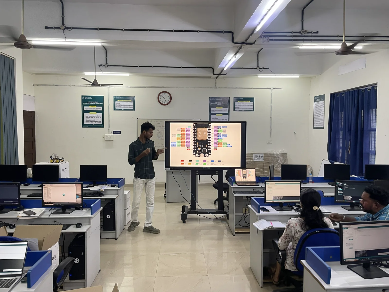 Faculty taking part in a hands-on Xenon Robotics training session